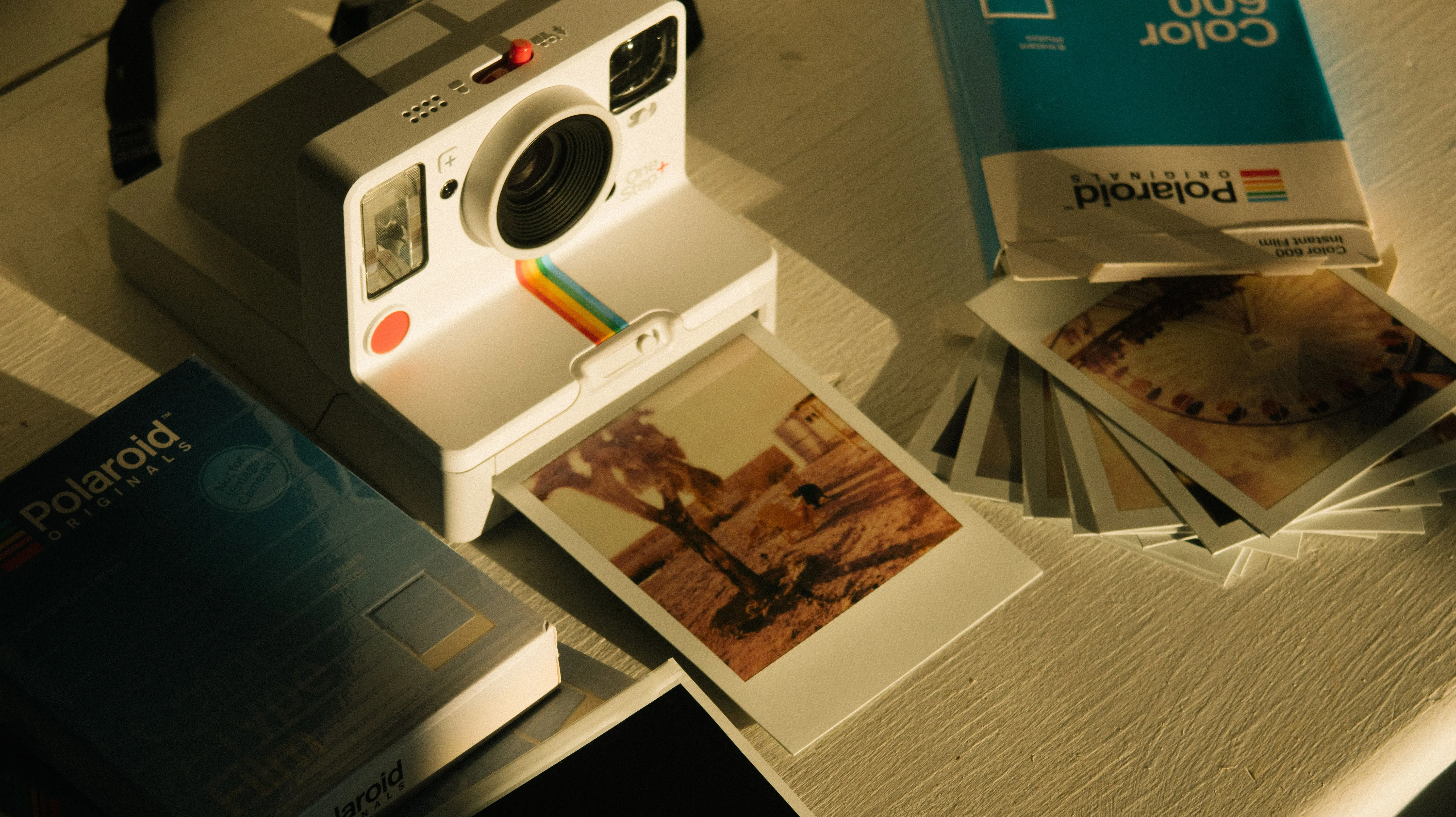 A snapshot of layered polaroids stacked like frozen moments in time.